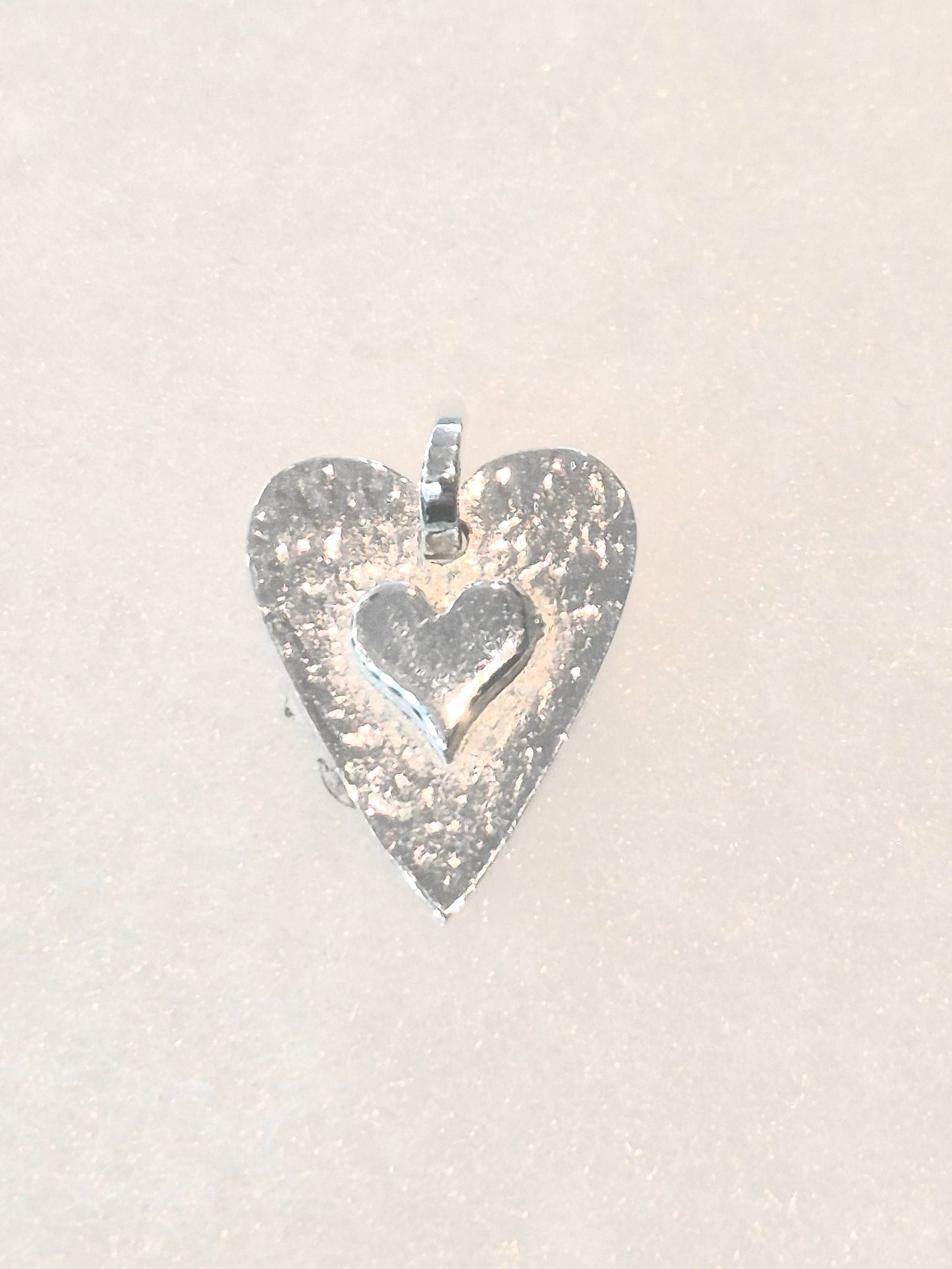 Double heart pendant