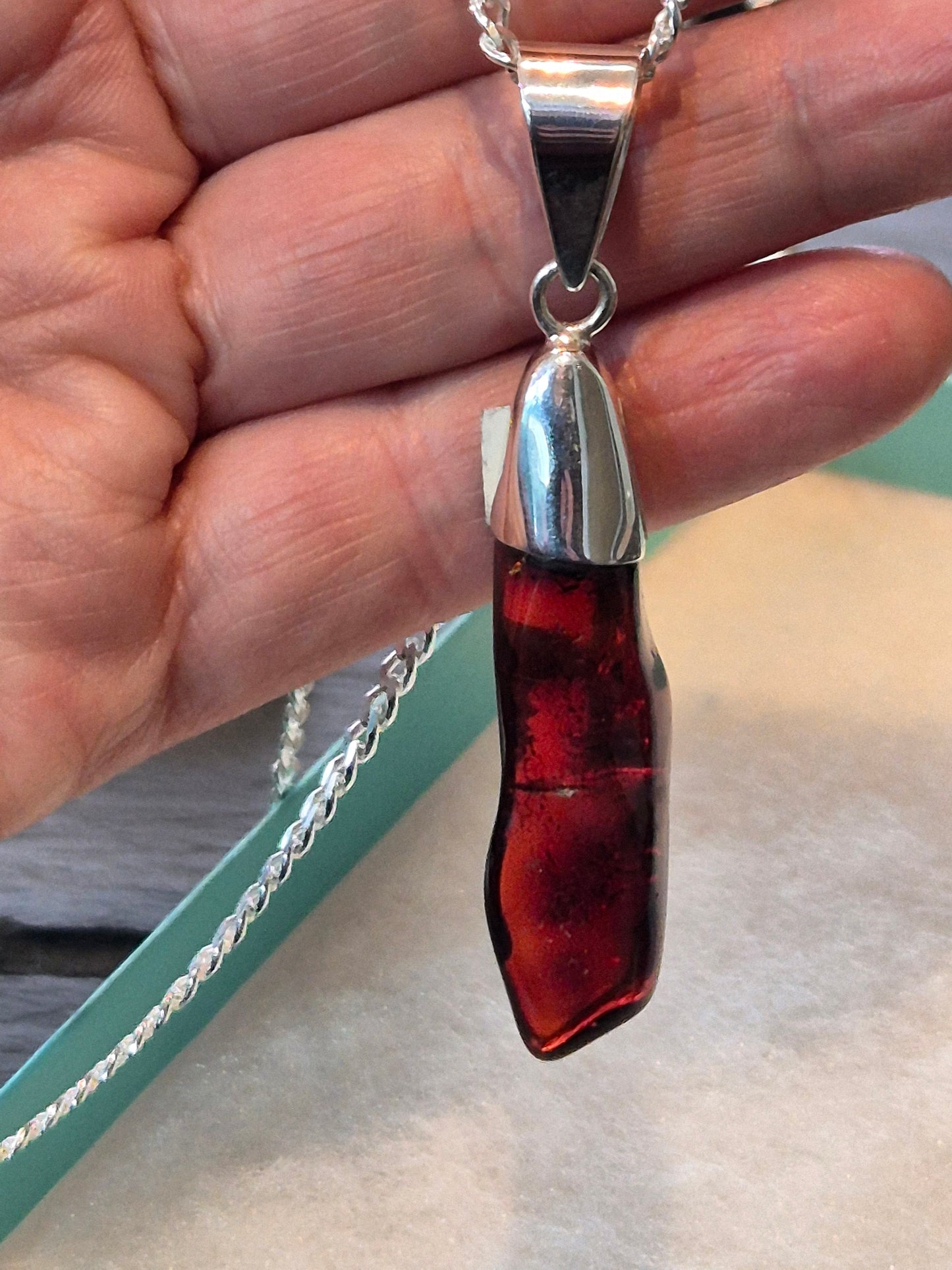 Red amber pendant